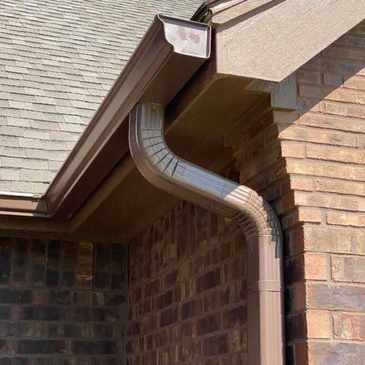 The painted roof and the gutter that was installed match exactly.