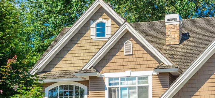 a house with completely installed rain gutters
